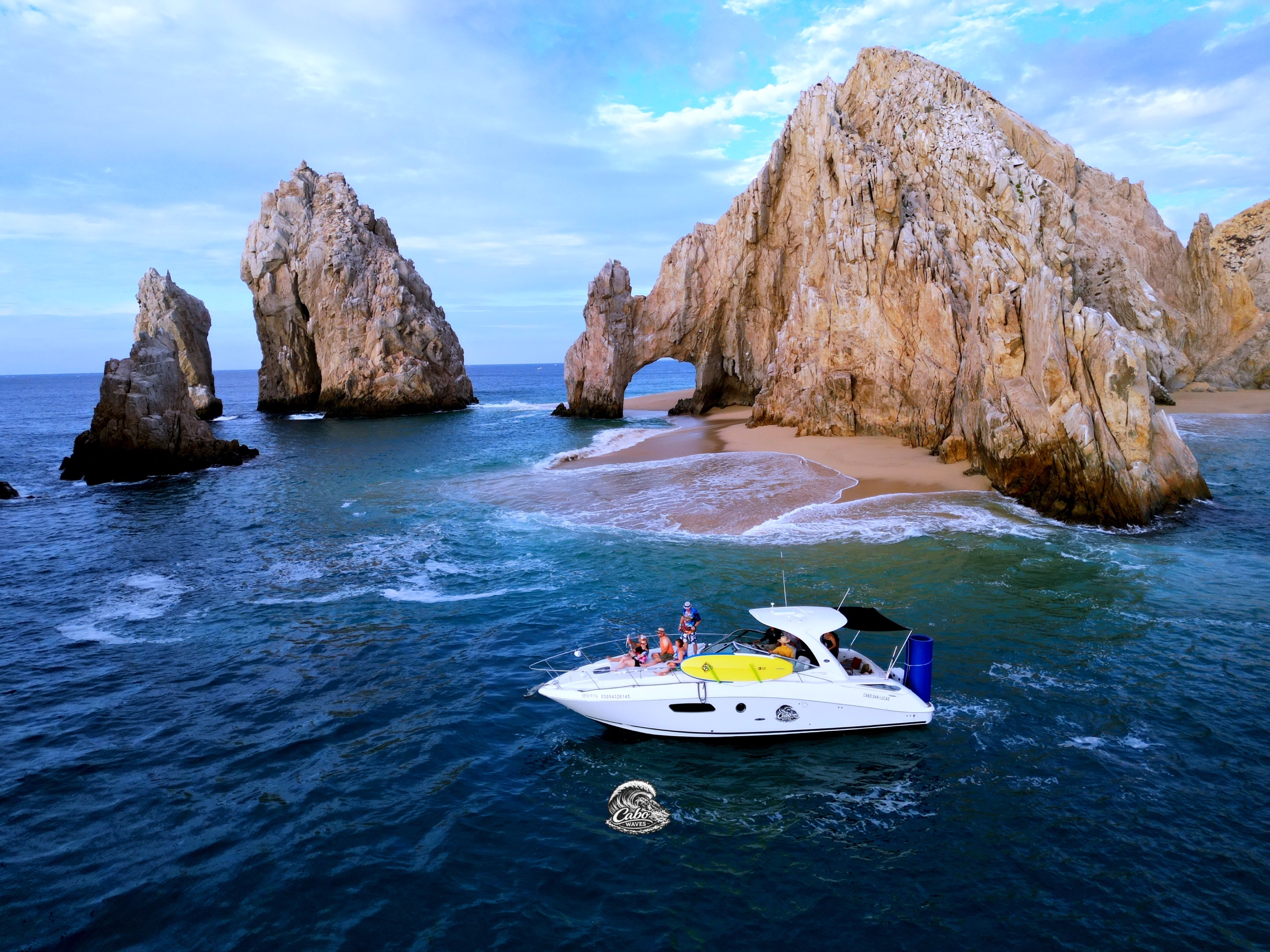 Señorita cruising in front of El Arco and Neptune’s Finger in Cabo San Lucas